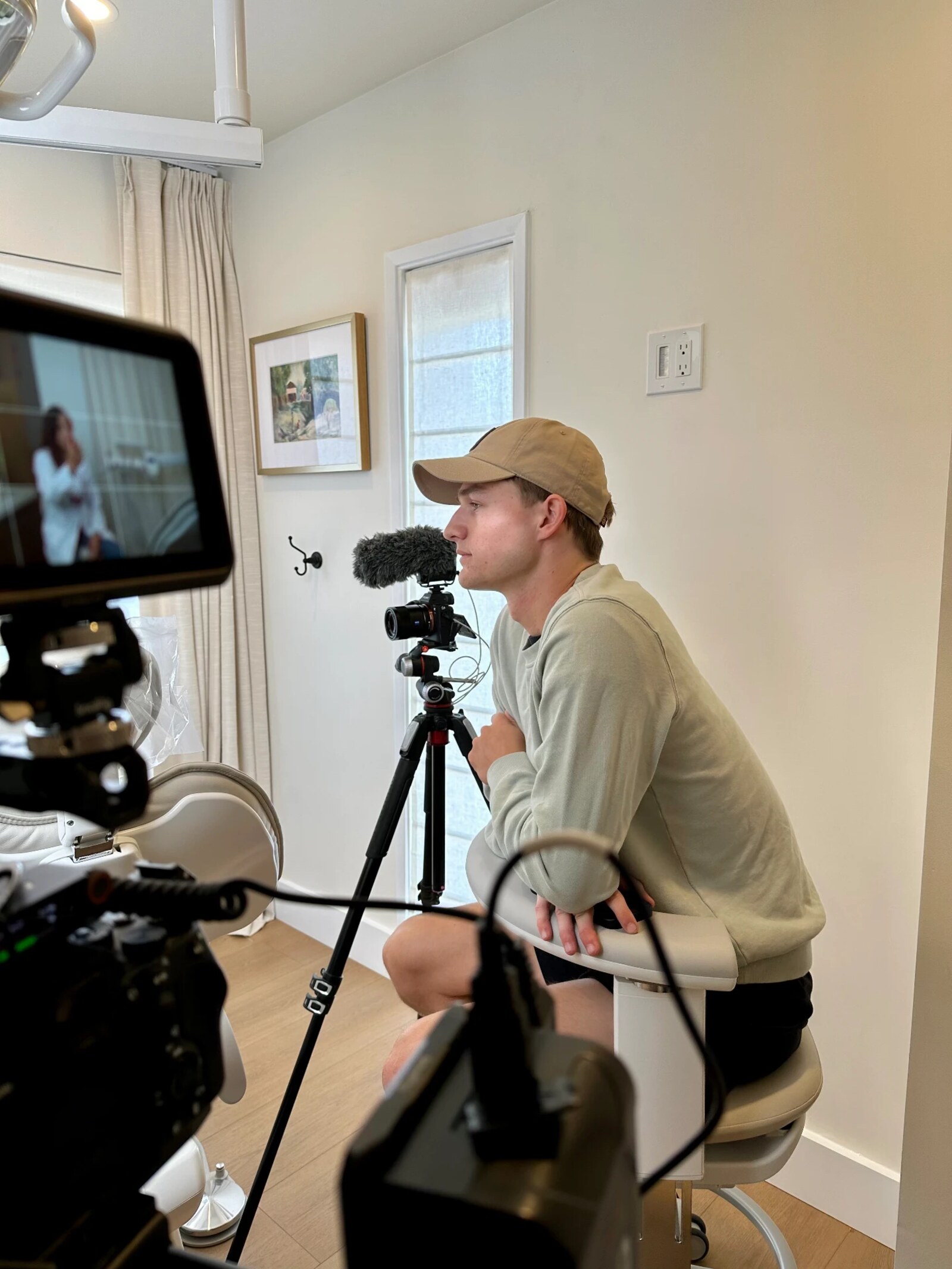 Prism Media videographer filming a client shoot on set